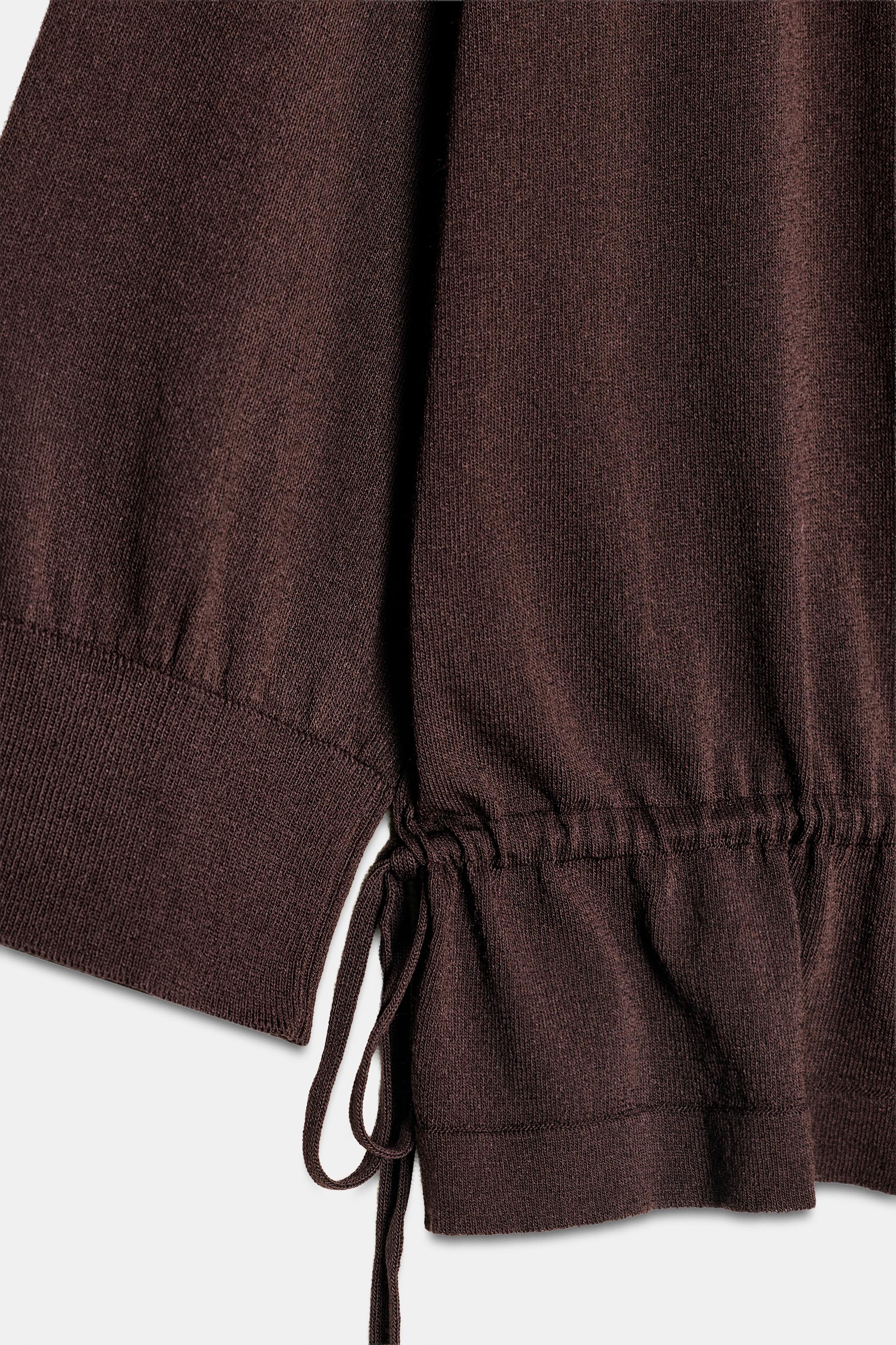 RUFFLED KNIT POLO